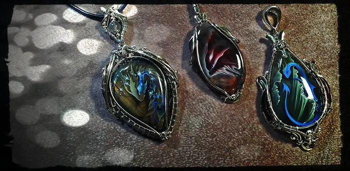 The Artist Draws Miniatures On Semi-Precious Stones. Dragons And Other Animals In Unusual Decorations.