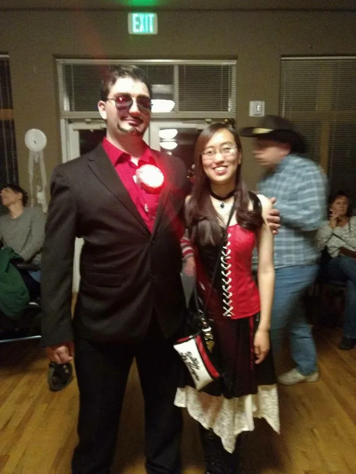 Tony H. As Tony Stark  (With A 3d Printed Custom Programmed Led Arc Reactor) And Elegant Rei As Harley Quinn.