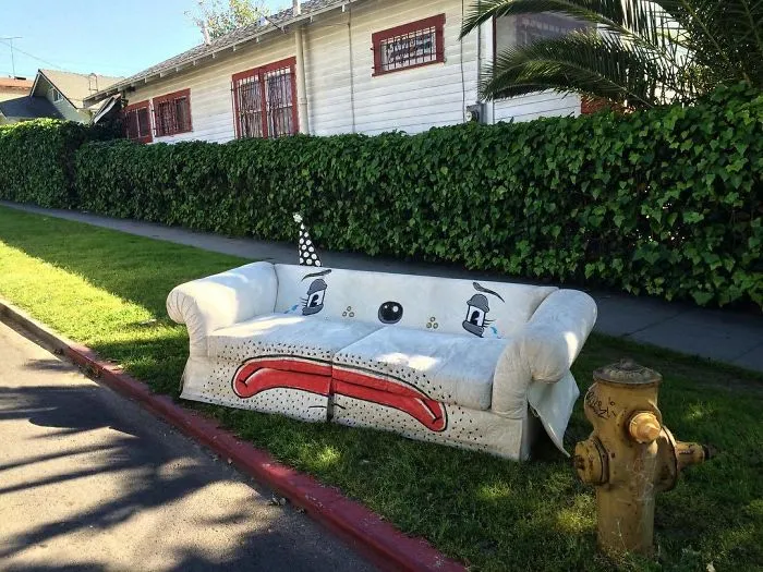 Artist Shows The Sorrow Of Thrown Away Objects He Finds In The Streets By Drawing Sad Clown Faces On Them