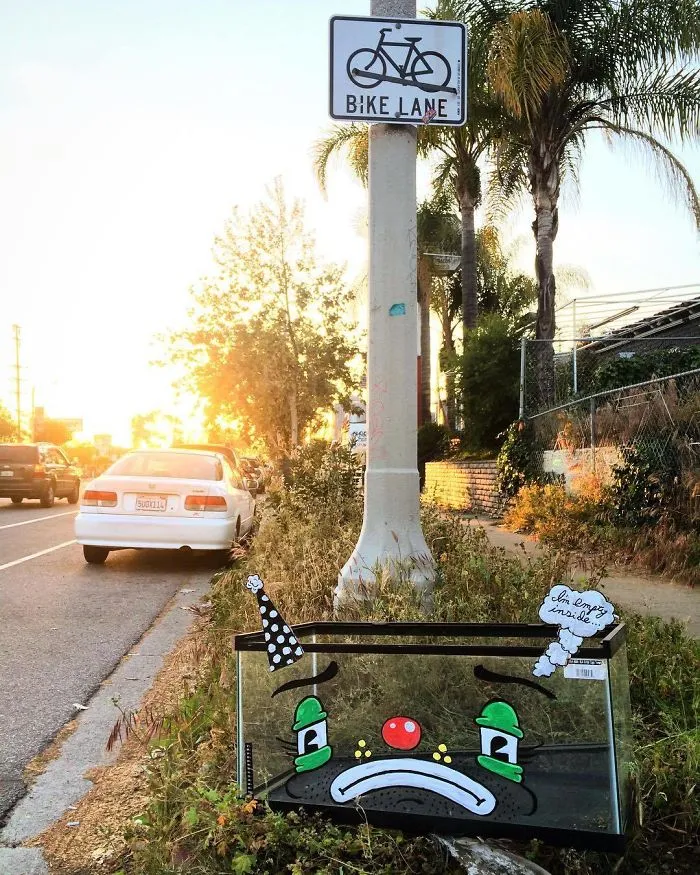 Artist Shows The Sorrow Of Thrown Away Objects He Finds In The Streets By Drawing Sad Clown Faces On Them