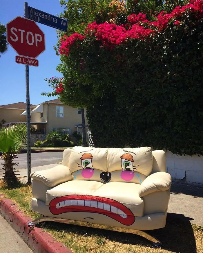Artist Shows The Sorrow Of Thrown Away Objects He Finds In The Streets By Drawing Sad Clown Faces On Them