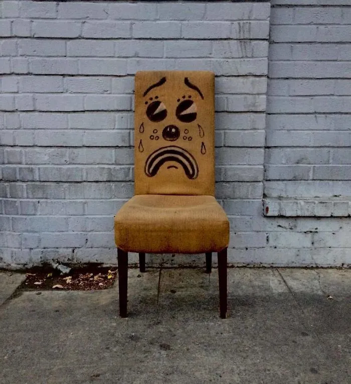 Artist Shows The Sorrow Of Thrown Away Objects He Finds In The Streets By Drawing Sad Clown Faces On Them