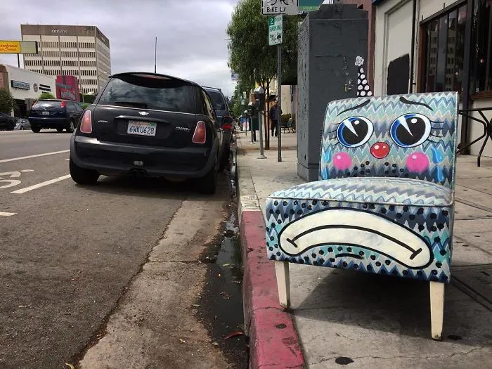 Artist Shows The Sorrow Of Thrown Away Objects He Finds In The Streets By Drawing Sad Clown Faces On Them