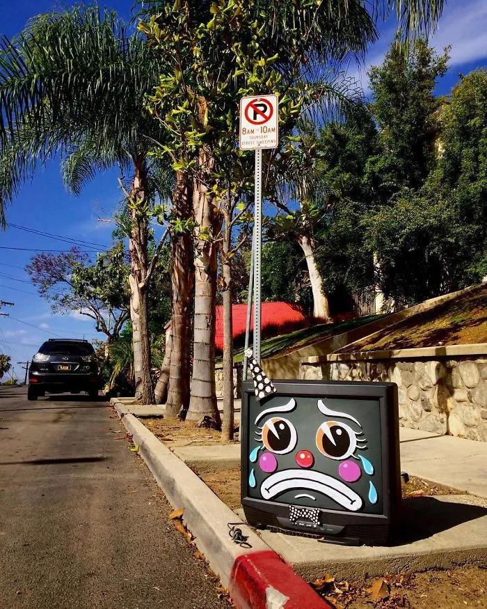 Artist Shows The Sorrow Of Thrown Away Objects He Finds In The Streets By Drawing Sad Clown Faces On Them
