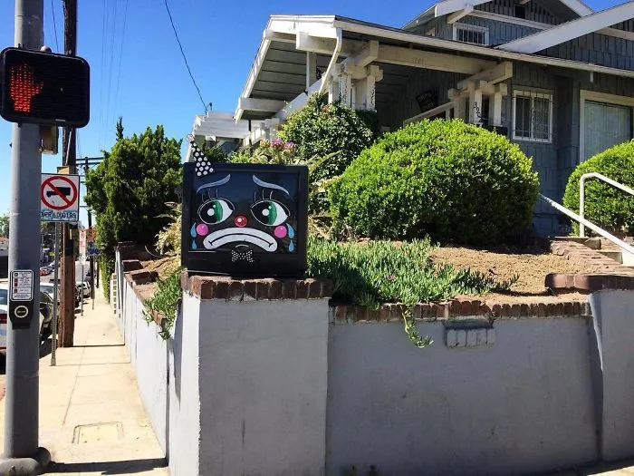 Artist Shows The Sorrow Of Thrown Away Objects He Finds In The Streets By Drawing Sad Clown Faces On Them