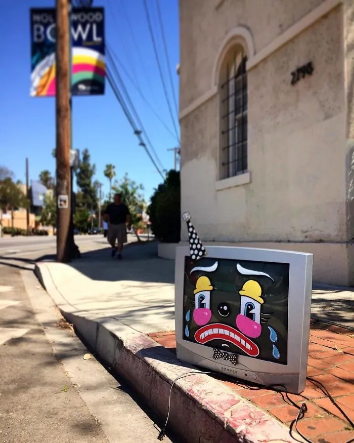 Artist Shows The Sorrow Of Thrown Away Objects He Finds In The Streets By Drawing Sad Clown Faces On Them