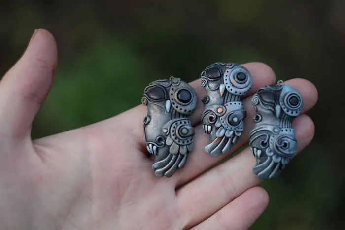Pendants "Owl Mahanoid" In The Gray Scale.
