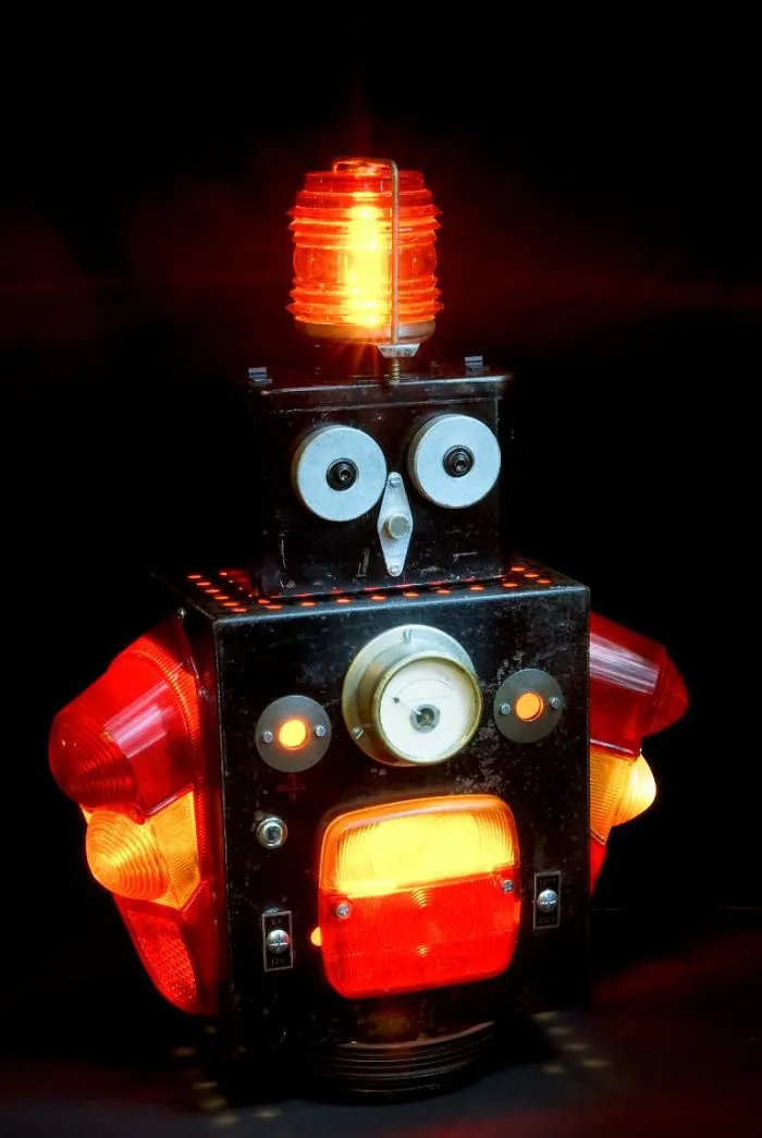 I Sculpt Illuminated Robots From Upcycled Materials