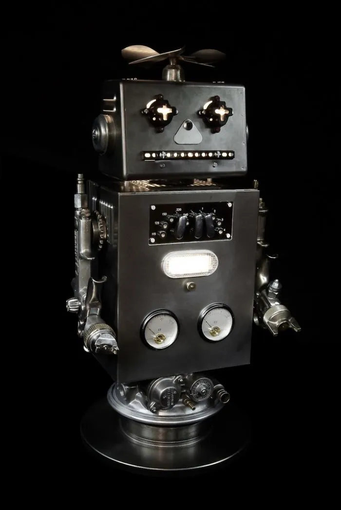 I Sculpt Illuminated Robots From Upcycled Materials