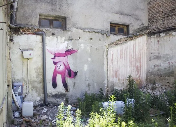 Artist Mixes His Mascot, An Adorable White Dog, With Wonderful Street Arts