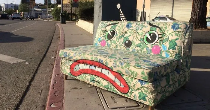 Artist Shows The Sorrow Of Thrown Away Objects He Finds In The Streets By Drawing Sad Clown Faces On Them