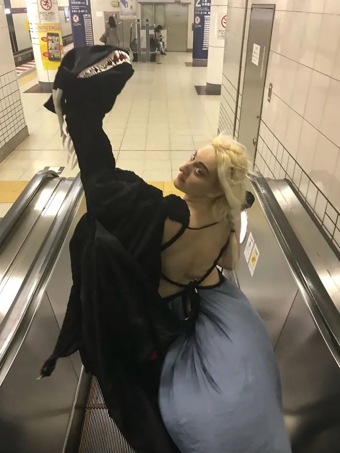 Daenerys And Drogon On An Escalator.