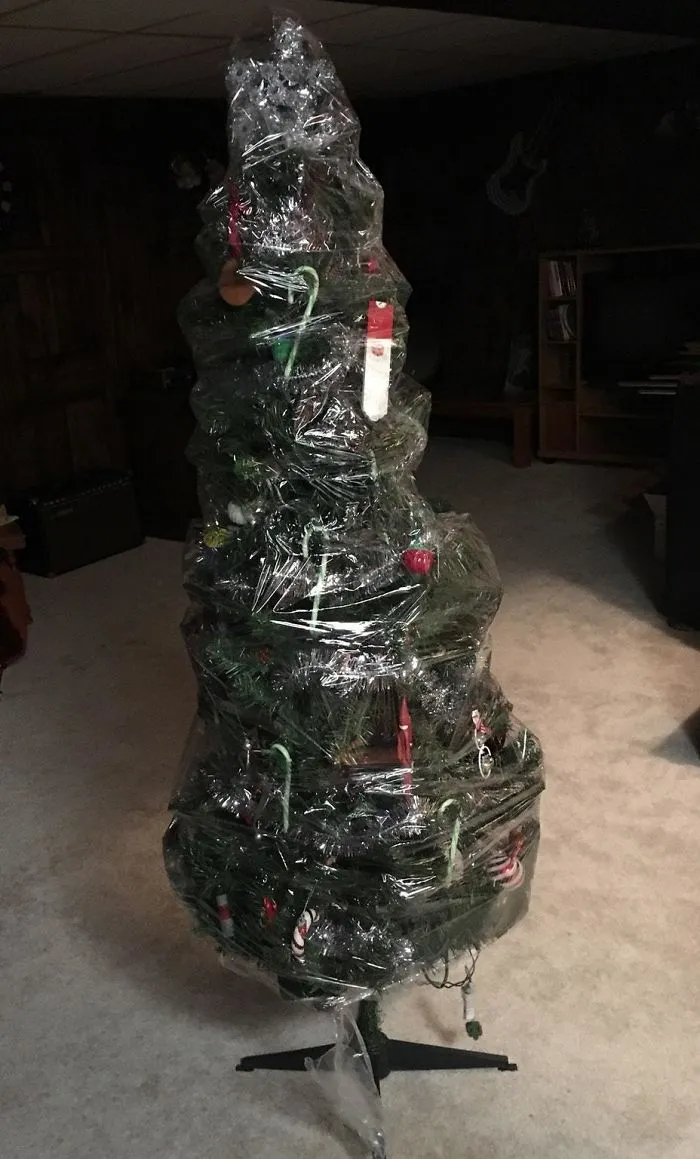 I Trusted My Husband To Clean-Up From Christmas Last Year. This Is What I Discovered When I Went Down To Our Basement To Begin Decorating This Year. He's So Proud! I Can't Decide: Life Hack Or Lazy?