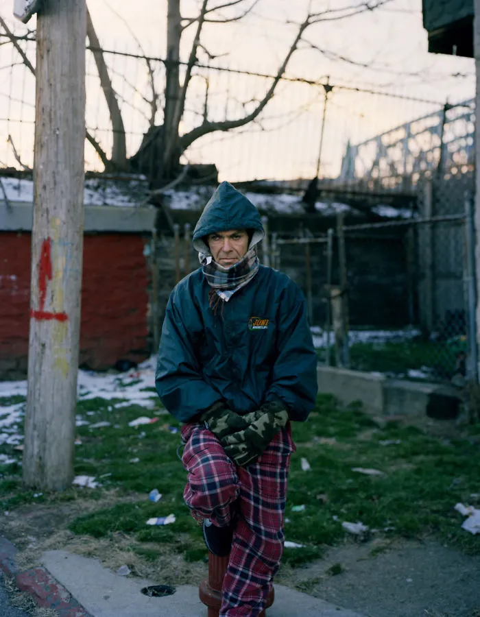 Portrait of Bobby standing on the street
