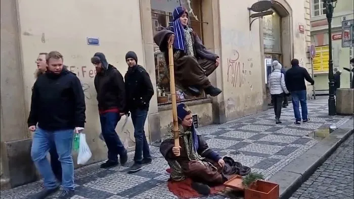 Street Artists In Prague. Great Optical Illusion Amongst The Crowd Of Tourists