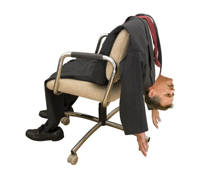 Man deflates and loses his spine on a chair