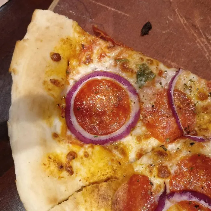The Way This Slice Of Pepperoni Fits Inside The Onion