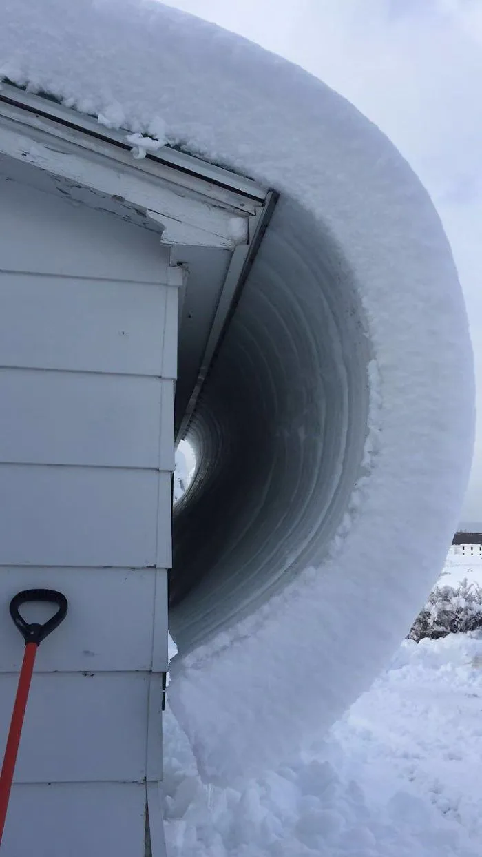 Snow Is Curling Off This Roof