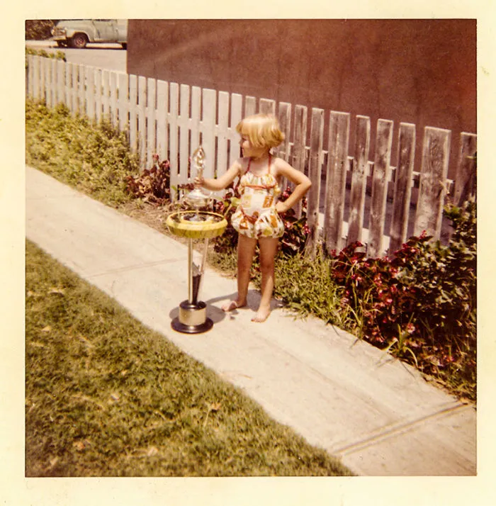Me In 1958 Standing Next To A Trophy My Dad Had Won That Weekend With His Drag Racing Car.  I Was 3 Years Old.