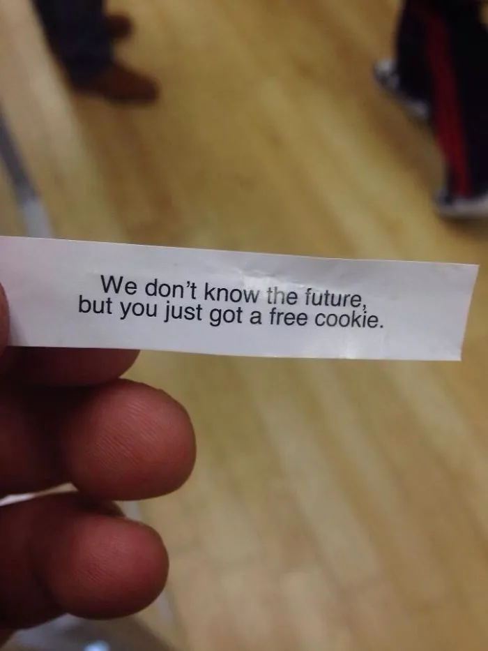 Fortune cookie paper with sassy saying: "We don't know the future, but you just got a free cookie."