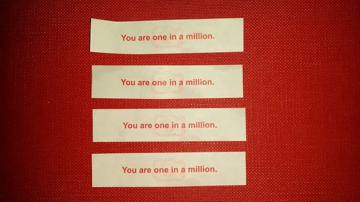 Fortune cookie sayings: "You are one in a million" repeated four times on a red background.