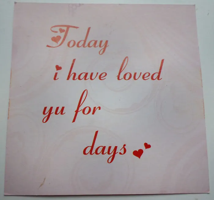 Valentine's design fail with text: "Today I have loved yu for days" on a pink card.