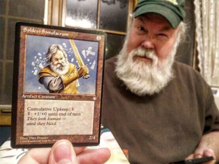 Bearded man resembling a card character, an example of accidental cosplay fit for Comic Con.