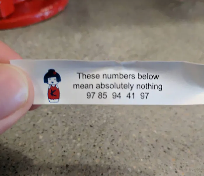 Sassy fortune cookie saying with random numbers for humor.