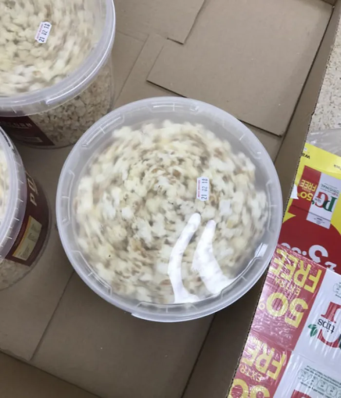 The Lids On These Tubs Of Popcorn Make It Look As If The Contents Are Spinning Really Fast
