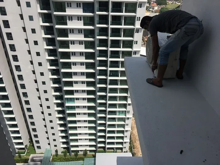 Fixing An AC Compressor On A Level 28 Ledge