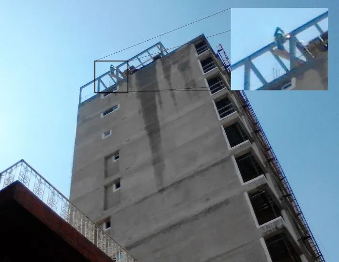 Welding 11 Stories Up While Standing On A Piece Of Wood Extended Off The Edge Of Building (Quito Ecuador)