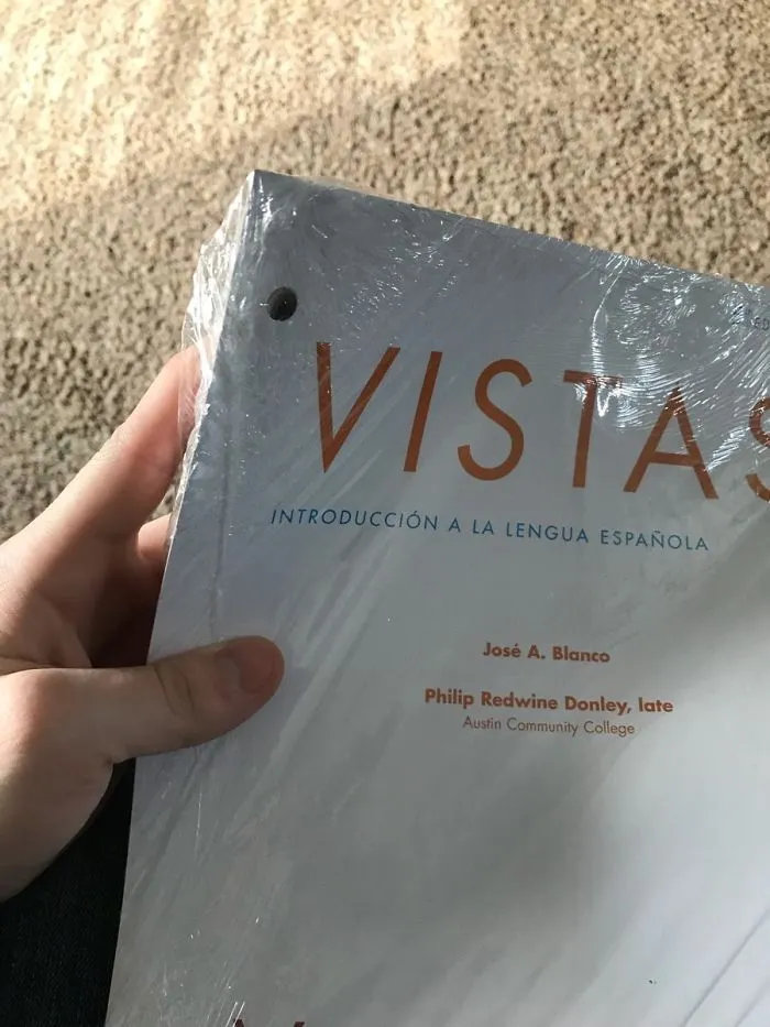 $275 Required Spanish Textbook Is Loose Leaf Paper Wrapped In Cellophane