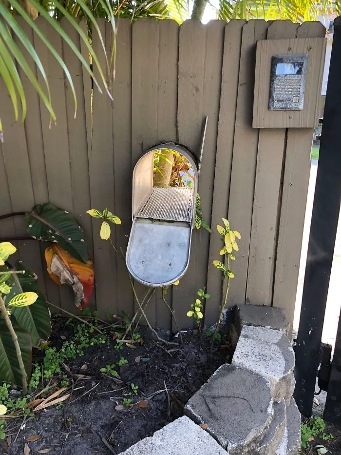 This Mailbox That Opens On Both Sides So The Homeowner Doesn’t Have To Open His Gate