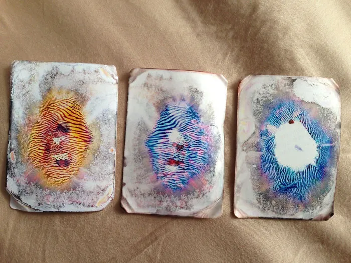 My Friend Gave Me Her Senior Pics But I Accidentally Ran Them Through The Wash. Pulled Them Apart And Found This Strange Art