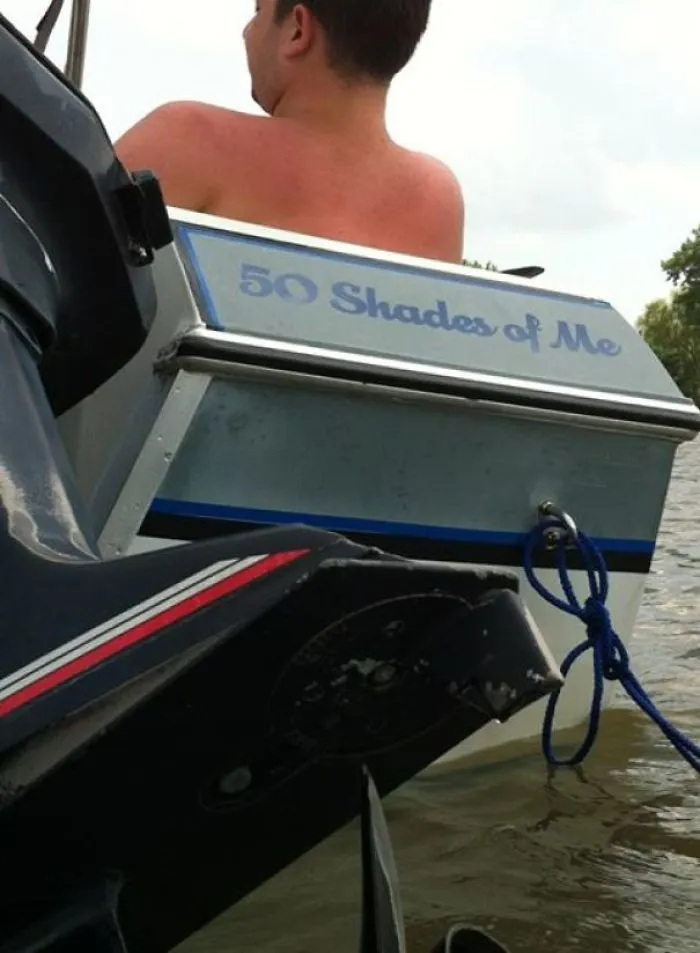 Man sitting in a funny named boat 
