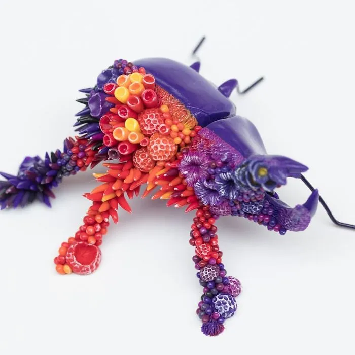Artist Upcycles Trash By Sculpting Vibrant Coral-Like Growths On It, And We're Digging The Message
