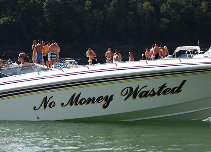 Funny and sarcastically named white boat 