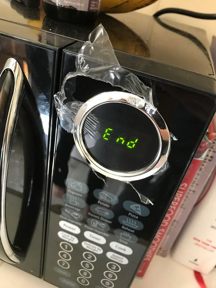 Pulling Off The Plastic Film Of A New Microwave, Only To Discover That They Put The Ring On Afterward