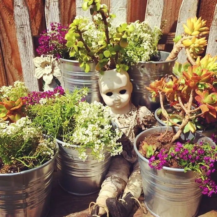 145 People Who Turned Old Dolls Into Planters And Scared The Hell Out Of Their Neighbors