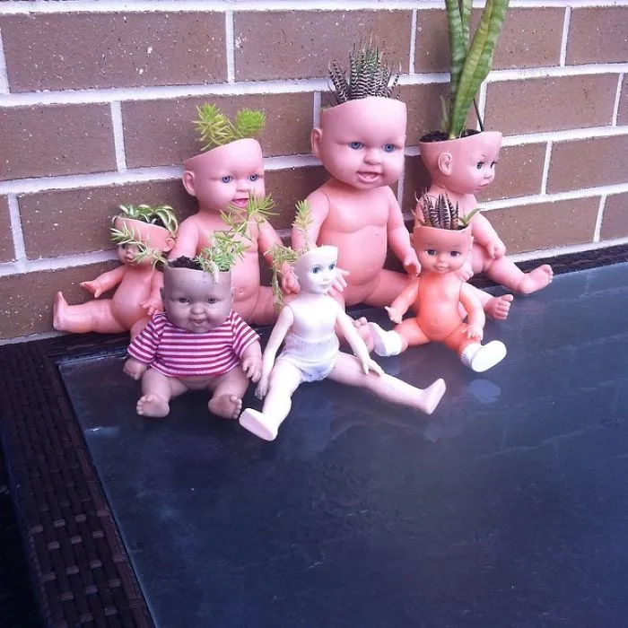 145 People Who Turned Old Dolls Into Planters And Scared The Hell Out Of Their Neighbors