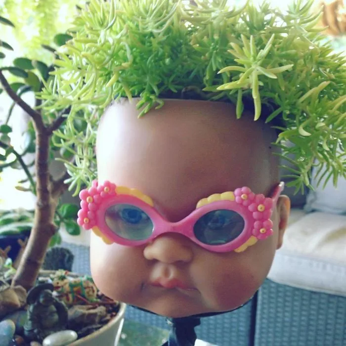 145 People Who Turned Old Dolls Into Planters And Scared The Hell Out Of Their Neighbors