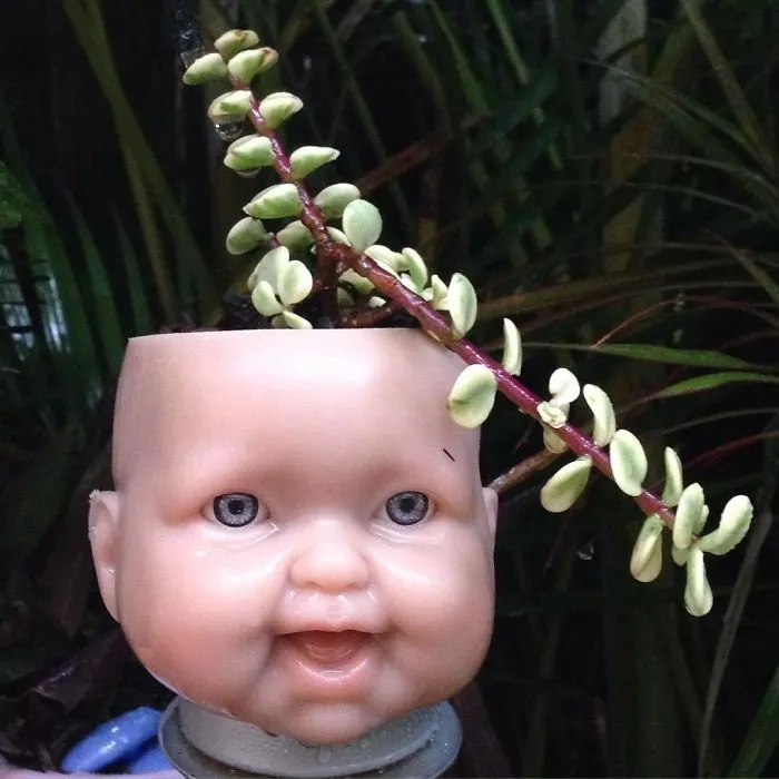 145 People Who Turned Old Dolls Into Planters And Scared The Hell Out Of Their Neighbors