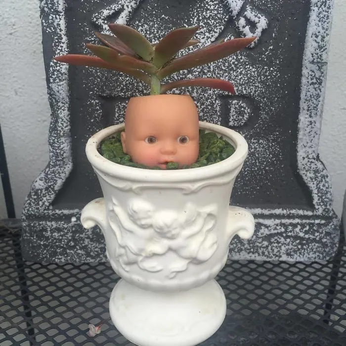 145 People Who Turned Old Dolls Into Planters And Scared The Hell Out Of Their Neighbors