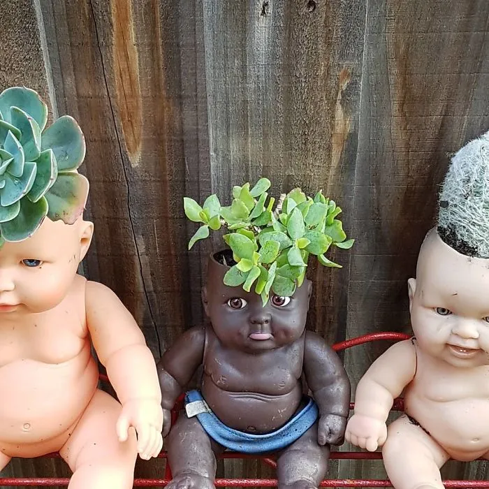 145 People Who Turned Old Dolls Into Planters And Scared The Hell Out Of Their Neighbors