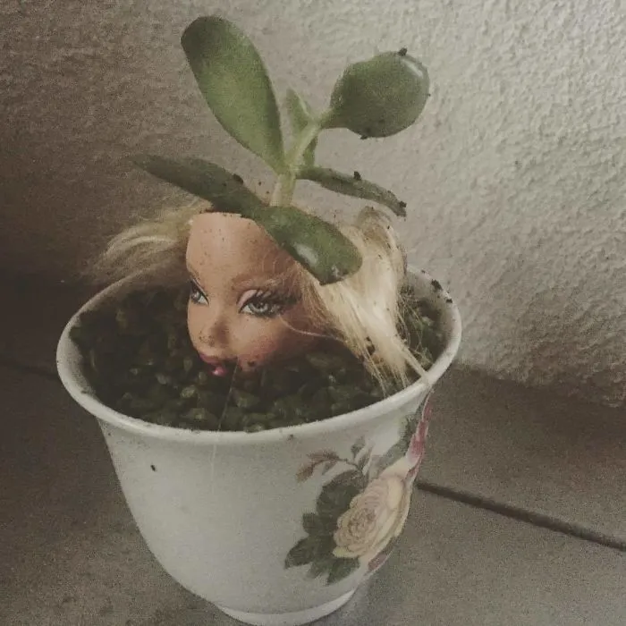 145 People Who Turned Old Dolls Into Planters And Scared The Hell Out Of Their Neighbors