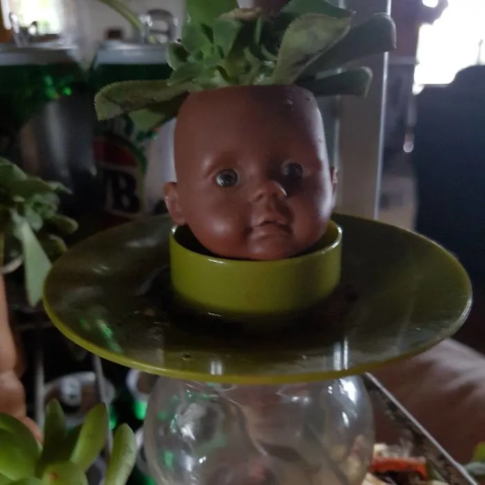 145 People Who Turned Old Dolls Into Planters And Scared The Hell Out Of Their Neighbors