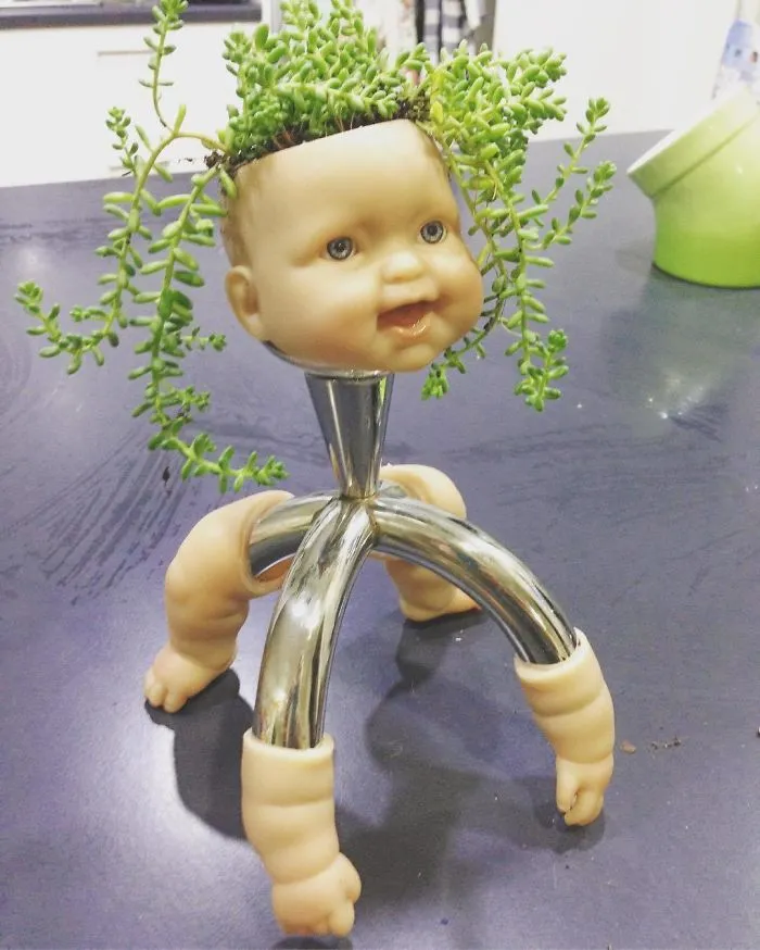 145 People Who Turned Old Dolls Into Planters And Scared The Hell Out Of Their Neighbors