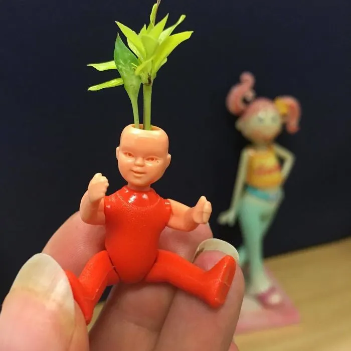 145 People Who Turned Old Dolls Into Planters And Scared The Hell Out Of Their Neighbors