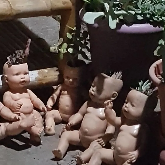 145 People Who Turned Old Dolls Into Planters And Scared The Hell Out Of Their Neighbors