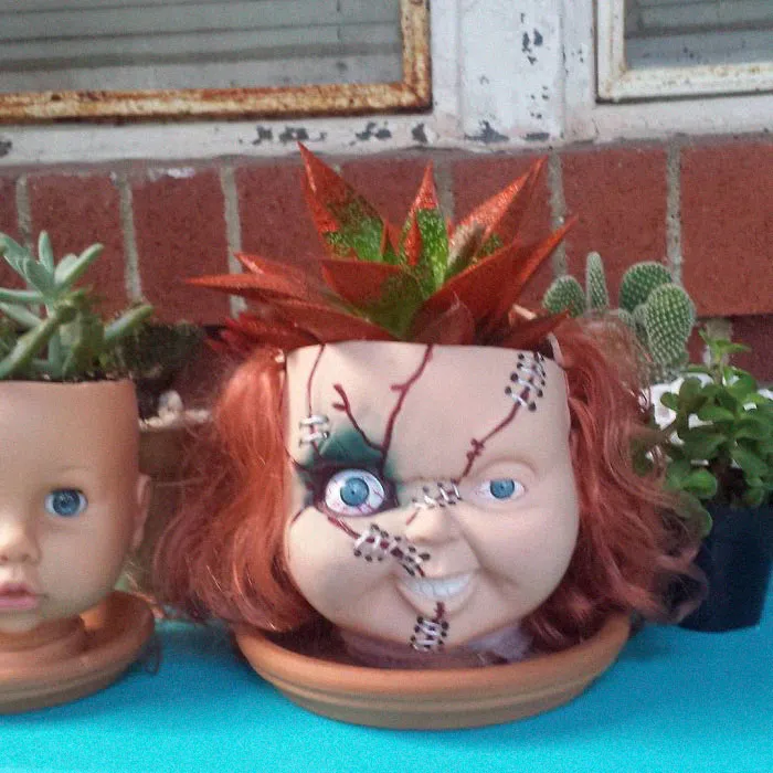 145 People Who Turned Old Dolls Into Planters And Scared The Hell Out Of Their Neighbors